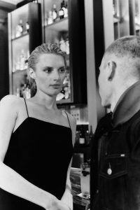 couple looking into each other's eyes at electric lemon bar and lounge