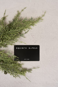 Equinox card with a pine branch